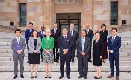 Front L-R: Mr Kenji Azuma (MDP), Ms Hannah McColl-Wayne (MDP), Professor Deborah Terry (UQ), Mr Sadahiko Haneji (MDP), Mr Peter N Varghese (UQ), Professor Vicki Chen (UQ), Mr Weston Bruner (UQ) Back L-R: Mr Taro Abe (MDP), Dr Ted Wynn (UQ), Mr Hiroshi Takehisa (MDP), Professor Ross McAree (UQ), Mr Tatsuro Sako (MDP), Ms Kanako Shimizu (MDP). Participants in the signing ceremony on the steps of UQ's Forgan Smith building